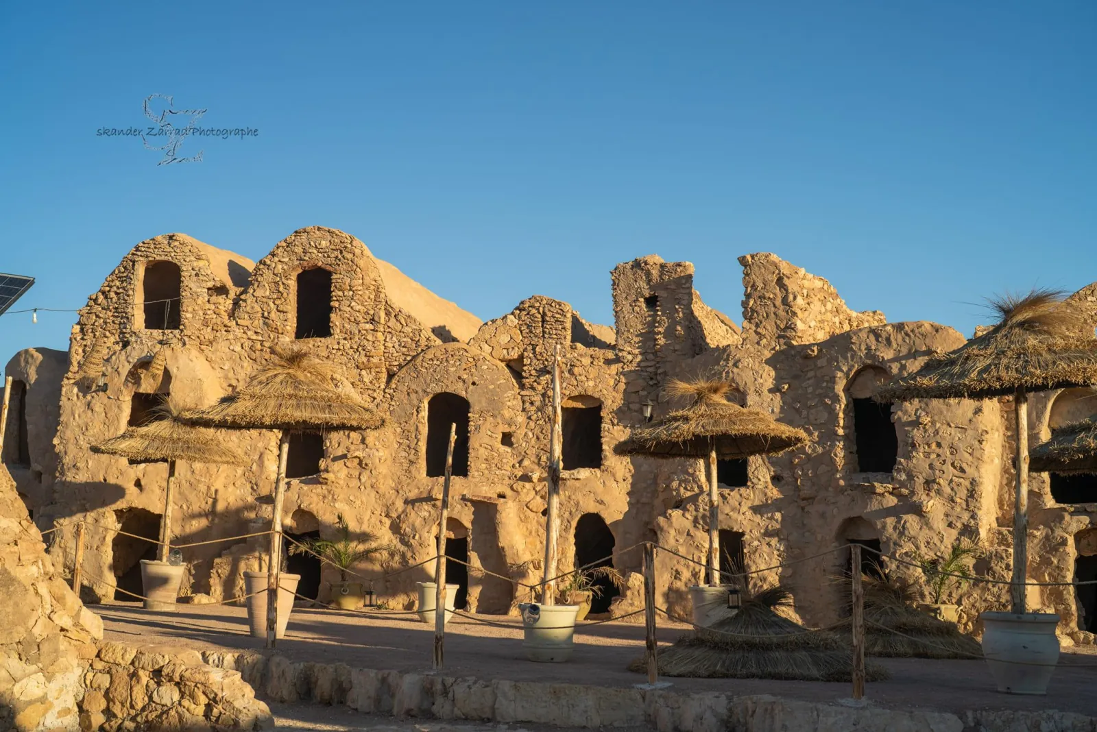 The restored vaulted granary cells of Ksar Hadada in low evening light